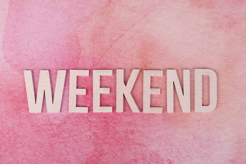 Weekend Text on a Pink Surface